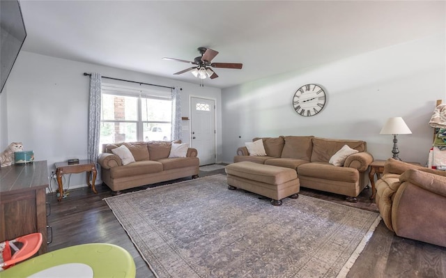 20336 Scholar Ln, Waynesville, MO 65583 - living area featuring dark wood finished floors and ceiling fan