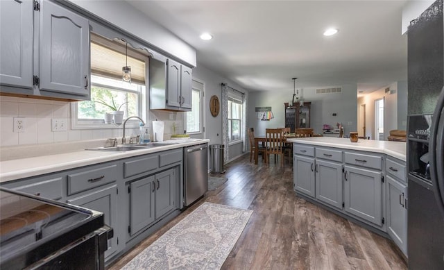 20336 Scholar Ln, Waynesville, MO 65583 - kitchen featuring gray cabinetry, black appliances, a sink, dark wood finished floors, and light countertops