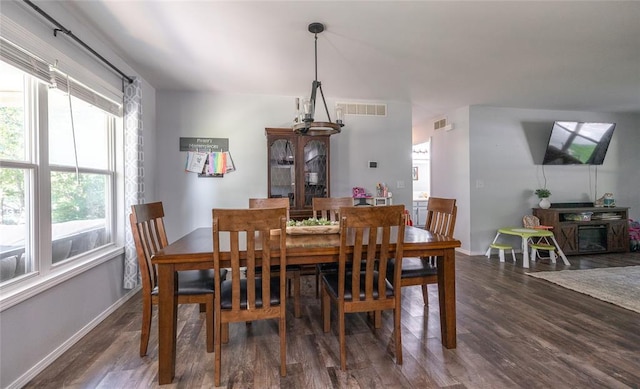 20336 Scholar Ln, Waynesville, MO 65583 - dining area featuring wood finished floors and baseboards