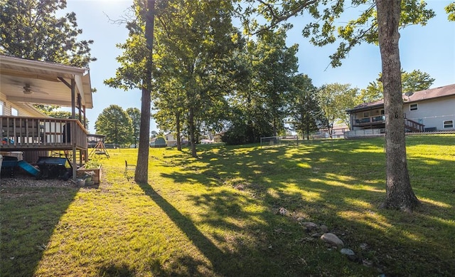 20336 Scholar Ln, Waynesville, MO 65583 - view of yard with a wooden deck, ceiling fan, and stairs