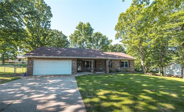 20336 Scholar Ln, Waynesville, MO 65583 - ranch-style home with concrete driveway and an attached garage