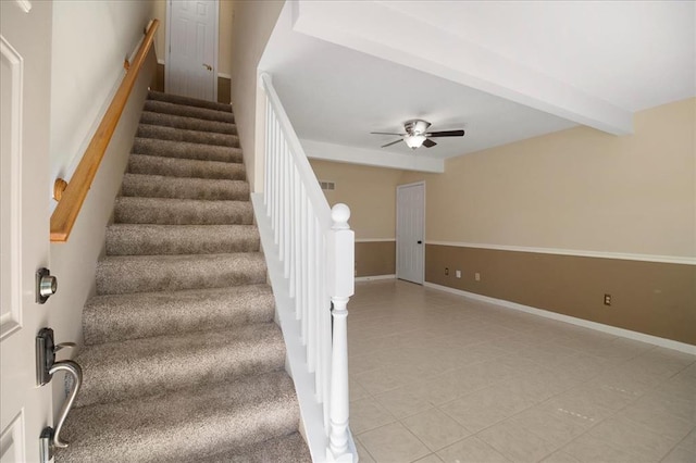 11846 Sologne Ct, Maryland Heights, MO 63043 - stairway with tile patterned floors, ceiling fan, baseboards, and beam ceiling