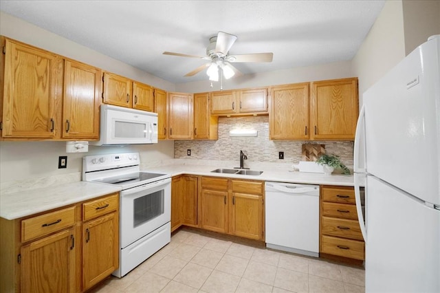 11846 Sologne Ct, Maryland Heights, MO 63043 - kitchen with white appliances, a sink, decorative backsplash, light countertops, and ceiling fan