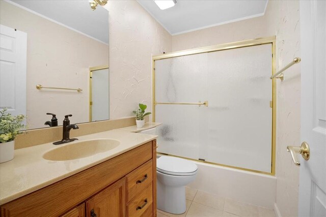 11846 Sologne Ct, Maryland Heights, MO 63043 - full bath featuring crown molding, vanity, toilet, tile patterned flooring, and enclosed tub / shower combo