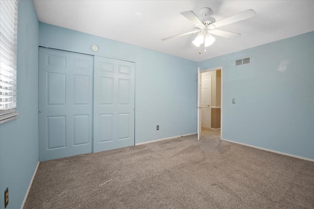 11846 Sologne Ct, Maryland Heights, MO 63043 - unfurnished bedroom featuring carpet floors, baseboards, a closet, and ceiling fan