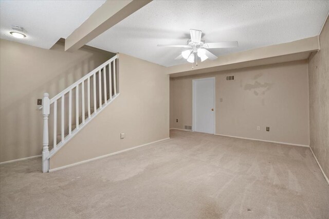 11846 Sologne Ct, Maryland Heights, MO 63043 - unfurnished living room featuring ceiling fan, carpet, stairway, and baseboards