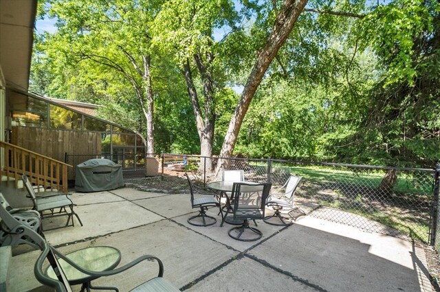 11846 Sologne Ct, Maryland Heights, MO 63043 - view of patio / terrace featuring outdoor dining area and area for grilling
