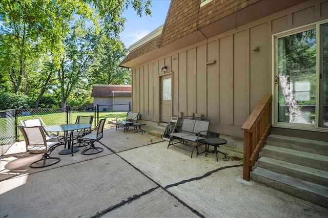 11846 Sologne Ct, Maryland Heights, MO 63043 - view of patio / terrace featuring entry steps and outdoor dining area