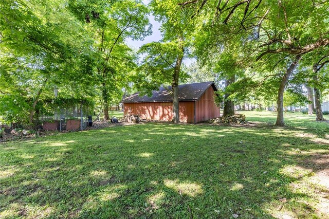 22 Greenbriar Dr, New Madrid, MO 63869 - view of grassy yard with an outbuilding