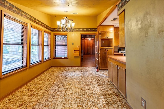 22 Greenbriar Dr, New Madrid, MO 63869 - corridor with a chandelier and baseboards