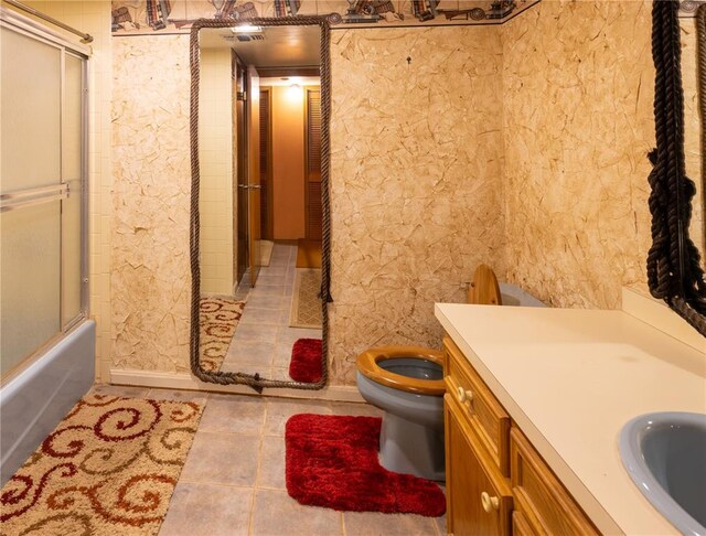 22 Greenbriar Dr, New Madrid, MO 63869 - full bath featuring toilet, tile patterned flooring, and vanity