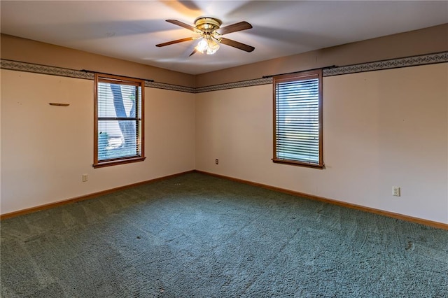 22 Greenbriar Dr, New Madrid, MO 63869 - empty room featuring carpet, baseboards, and ceiling fan