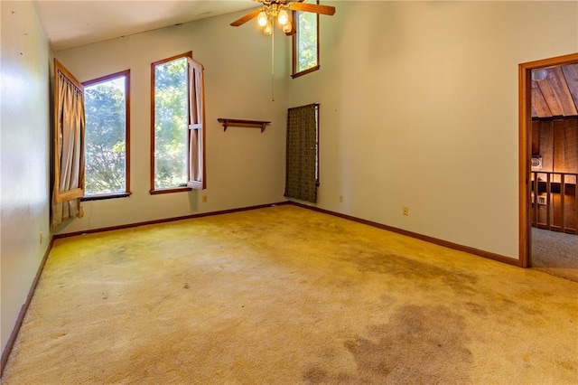 22 Greenbriar Dr, New Madrid, MO 63869 - carpeted spare room with plenty of natural light, a ceiling fan, and baseboards