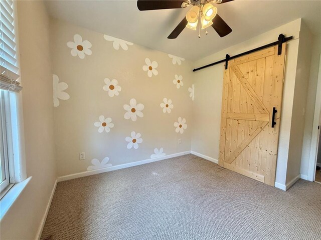 7729 Humbert Rd, Godfrey, IL 62035 - unfurnished bedroom featuring carpet, baseboards, and multiple windows