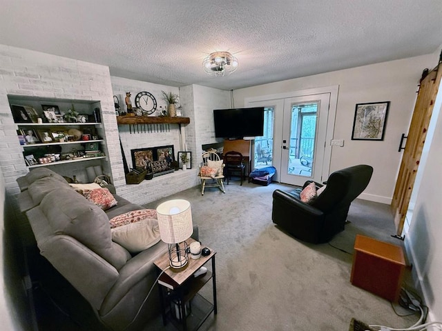 11181 Shady Ln, Dexter, MO 63841 - living area with carpet flooring, a textured ceiling, a fireplace, french doors, and baseboards