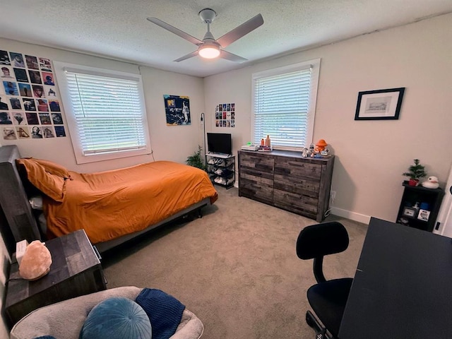 11181 Shady Ln, Dexter, MO 63841 - bedroom with carpet flooring, a ceiling fan, a textured ceiling, and an office area