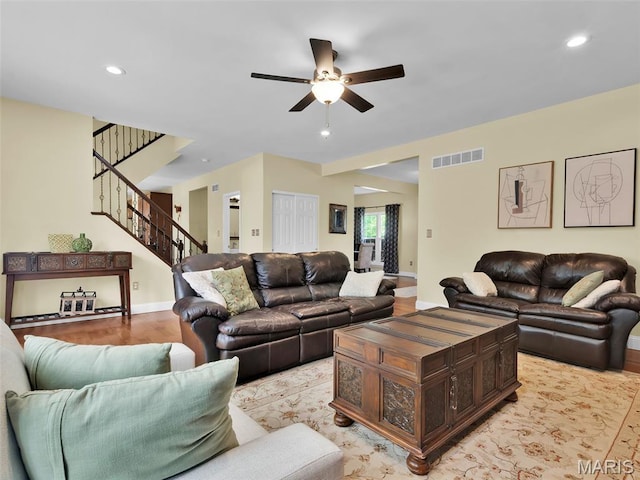 1165 Nooning Tree Dr, Chesterfield, MO 63017 - living room with ceiling fan, stairway, recessed lighting, light wood finished floors, and baseboards