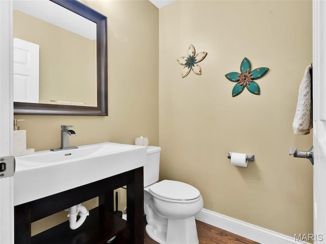 1165 Nooning Tree Dr, Chesterfield, MO 63017 - bathroom with toilet, baseboards, wood finished floors, and vanity