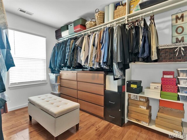 1165 Nooning Tree Dr, Chesterfield, MO 63017 - spacious closet featuring wood finished floors