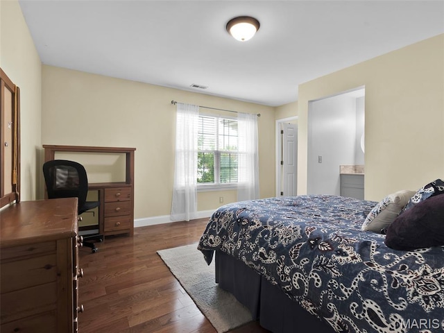 1165 Nooning Tree Dr, Chesterfield, MO 63017 - bedroom with dark wood finished floors, baseboards, and a desk