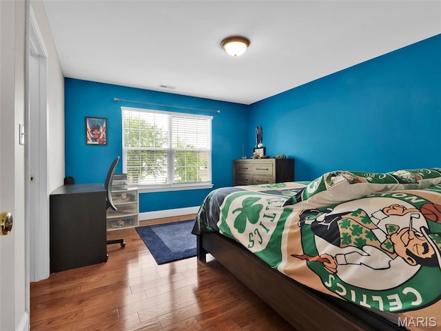 1165 Nooning Tree Dr, Chesterfield, MO 63017 - bedroom featuring wood finished floors and baseboards