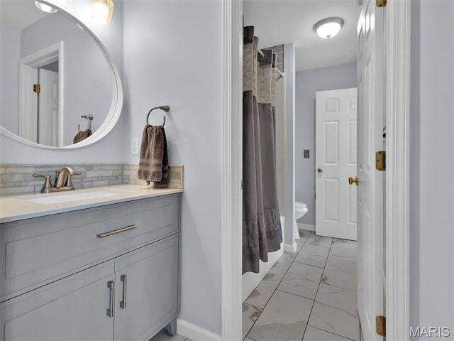 1165 Nooning Tree Dr, Chesterfield, MO 63017 - full bath with marble look tiles, vanity, tasteful backsplash, a shower with curtain, and toilet