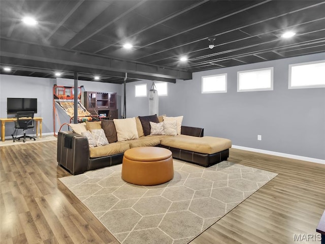 1165 Nooning Tree Dr, Chesterfield, MO 63017 - living area with baseboards, wood finished floors, and a desk