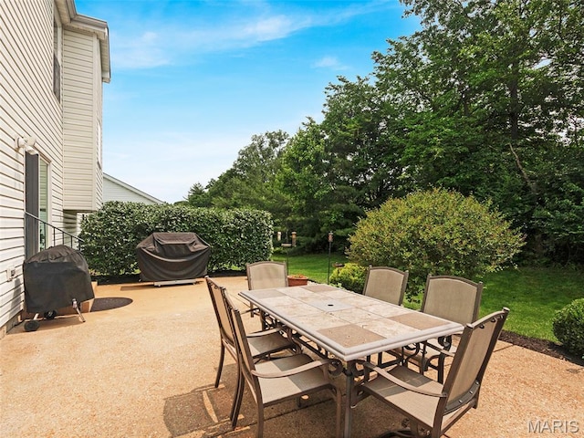 1165 Nooning Tree Dr, Chesterfield, MO 63017 - view of patio / terrace featuring outdoor dining space and grilling area