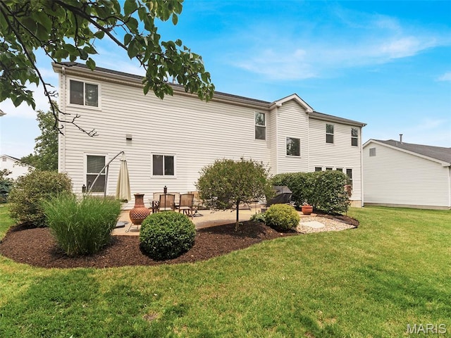 1165 Nooning Tree Dr, Chesterfield, MO 63017 - rear view of house featuring a patio area and a yard
