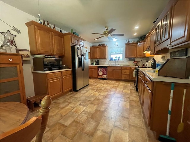 95 W Lakeview Dr, De Soto, MO 63020 - kitchen featuring stainless steel fridge with ice dispenser, dishwasher, a ceiling fan, light countertops, and a sink