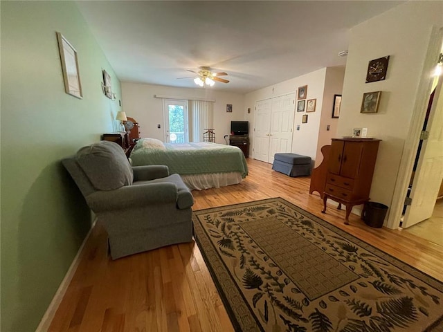 95 W Lakeview Dr, De Soto, MO 63020 - bedroom with light wood-style flooring, a ceiling fan, access to outside, and baseboards