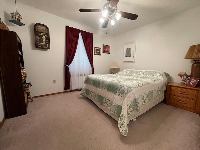 95 W Lakeview Dr, De Soto, MO 63020 - bedroom with light carpet, baseboards, and a ceiling fan