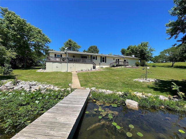 95 W Lakeview Dr, De Soto, MO 63020 - rear view of house featuring a lawn and a wooden deck