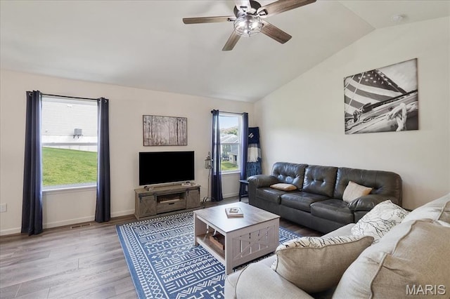 800 Boulder Crest Ct, Eureka, MO 63025 - living room featuring vaulted ceiling, wood finished floors, a ceiling fan, and baseboards