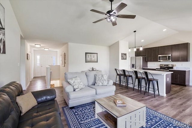 800 Boulder Crest Ct, Eureka, MO 63025 - living room featuring wood finished floors, a ceiling fan, lofted ceiling, baseboards, and recessed lighting