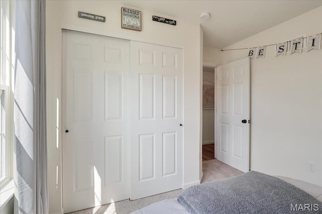 800 Boulder Crest Ct, Eureka, MO 63025 - unfurnished bedroom featuring a closet, lofted ceiling, and carpet