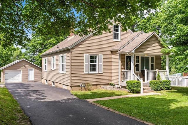 1605 W Main St, Festus, MO 63028 - view of front of home with a detached garage, an outbuilding, covered porch, and a chimney