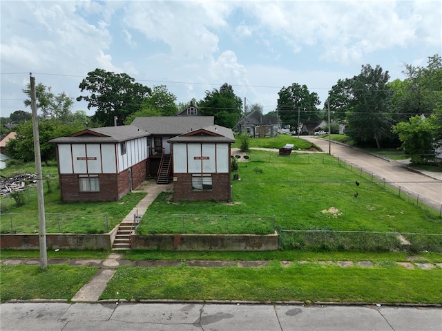 818 Kinzer St, Poplar Bluff, MO 63901 - english style home featuring stairs and brick siding
