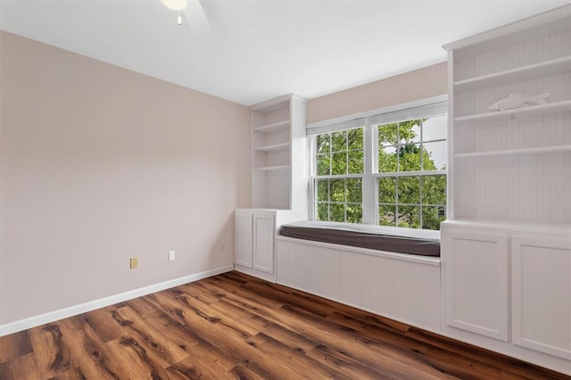 3912 Jacobs Lndg, Saint Charles, MO 63304 - spare room featuring dark wood-style floors, baseboards, and a ceiling fan