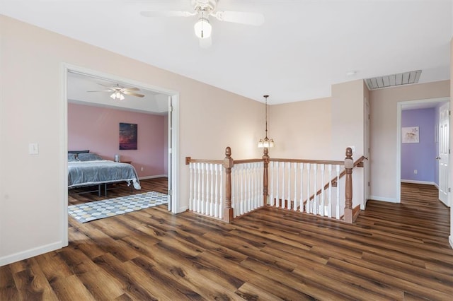 3912 Jacobs Lndg, Saint Charles, MO 63304 - hall featuring wood finished floors, baseboards, and an upstairs landing