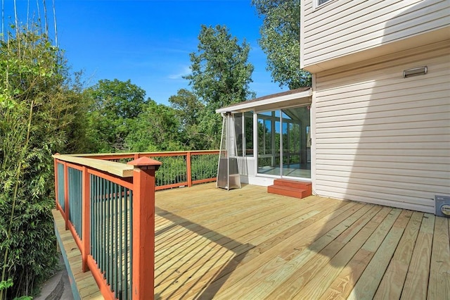 3912 Jacobs Lndg, Saint Charles, MO 63304 - wooden terrace featuring a sunroom