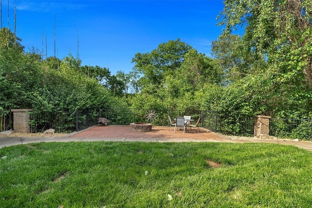 3912 Jacobs Lndg, Saint Charles, MO 63304 - view of yard featuring an outdoor fire pit and a patio