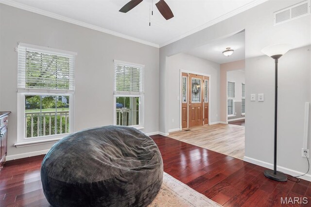 3912 Jacobs Lndg, Saint Charles, MO 63304 - sitting room featuring crown molding, wood finished floors, a ceiling fan, and baseboards