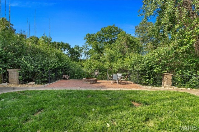3912 Jacobs Lndg, Saint Charles, MO 63304 - view of yard with an outdoor fire pit and a patio