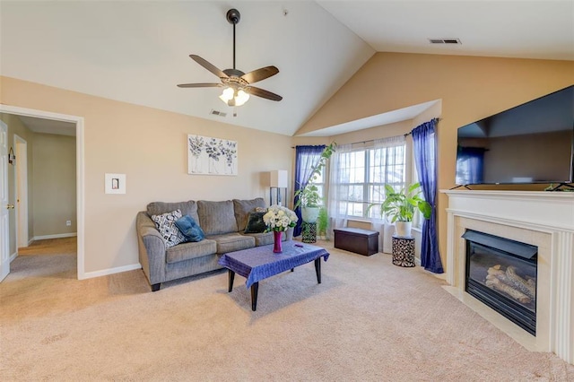 480 Benton Dr Unit L, Saint Peters, MO 63376 - carpeted living room with ceiling fan, high vaulted ceiling, a fireplace with flush hearth, and baseboards