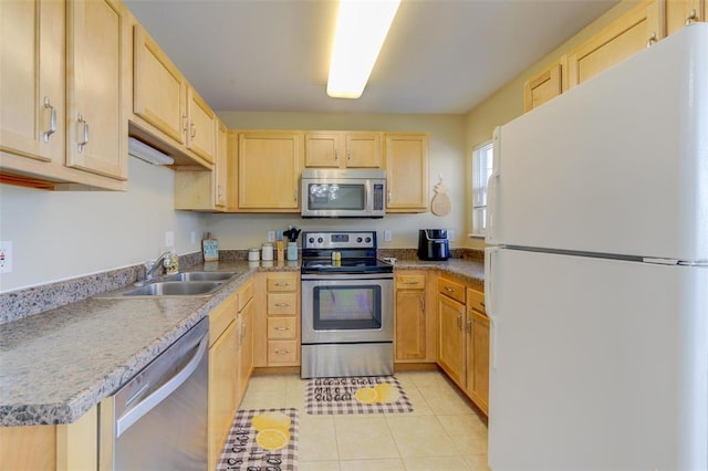 480 Benton Dr Unit L, Saint Peters, MO 63376 - kitchen with appliances with stainless steel finishes, light brown cabinets, a sink, and light tile patterned flooring