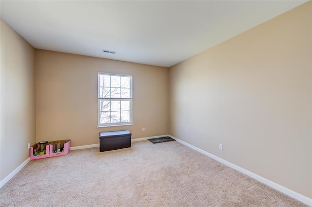 480 Benton Dr Unit L, Saint Peters, MO 63376 - spare room featuring baseboards and carpet flooring