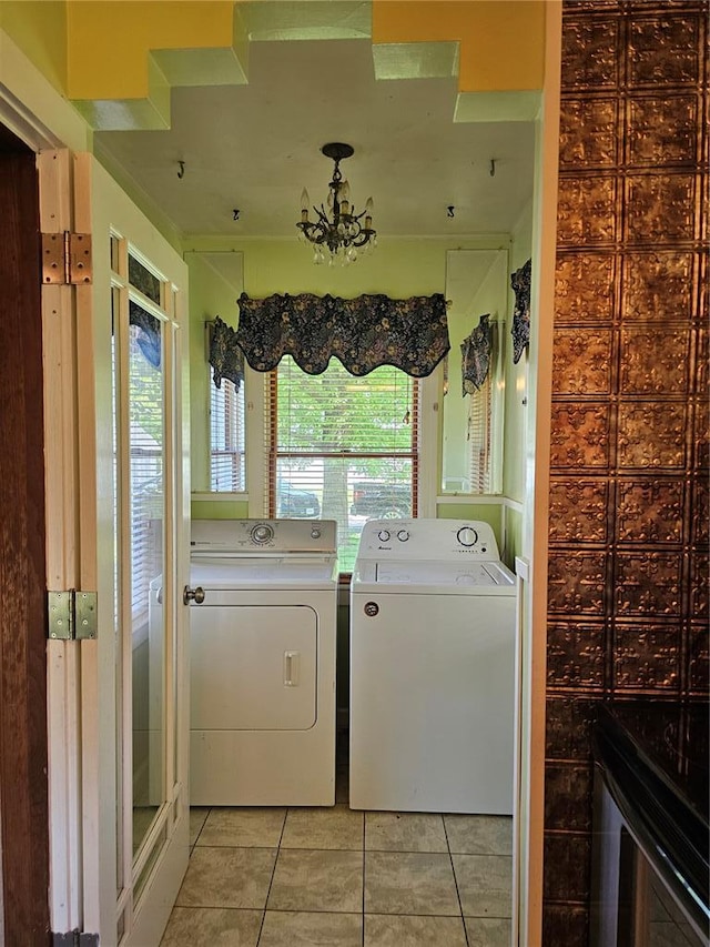 506 S Sparta St, Steeleville, IL 62288 - laundry area with light tile patterned flooring, independent washer and dryer, and a chandelier