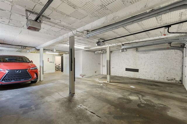 7520 Buckingham Dr Unit 1W, Saint Louis, MO 63105 - garage with a garage door opener