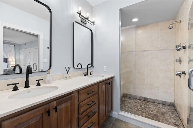 7520 Buckingham Dr Unit 1W, Saint Louis, MO 63105 - bathroom with double vanity, tiled shower, and recessed lighting
